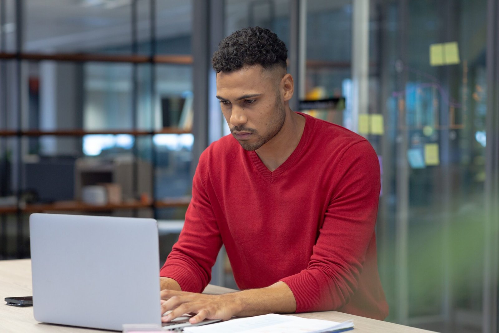 confident-hispanic-male-advisor-using-laptop-while-BMYB4Q8-scaled.jpg