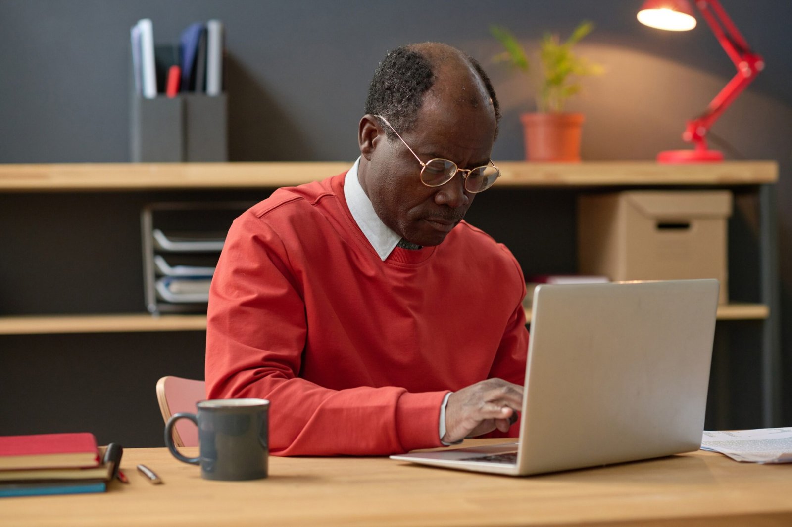 manager-working-online-on-laptop-VYXBQ7J-scaled.jpg